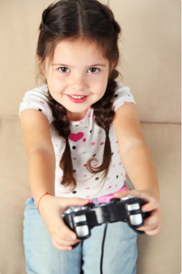 Girl playing Video Games Help Learn English Better than School