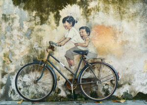Graffiti of children on a bicycle